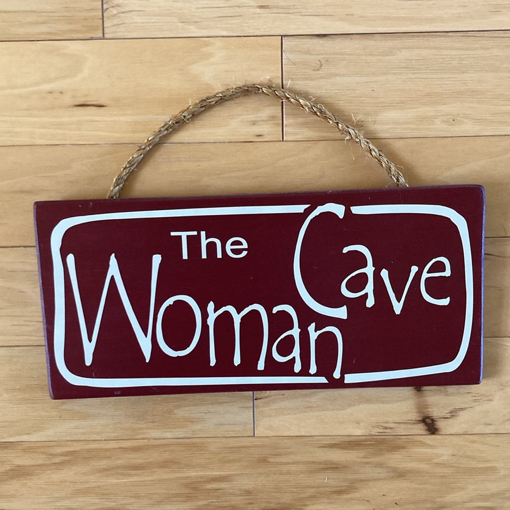 The Woman Cave Sign